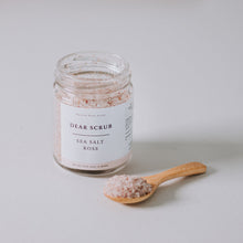 Load image into Gallery viewer, Sea Salt rose body scrub with wooden spoon and neutral background
